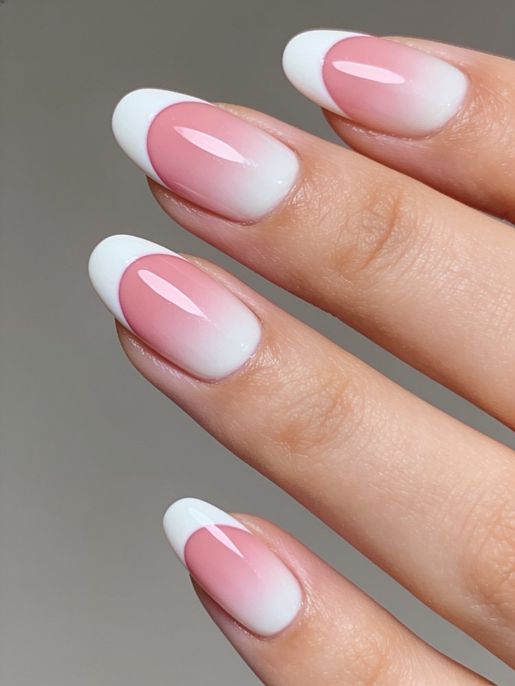 Medium coffin acrylic nails in a pink to white ombre