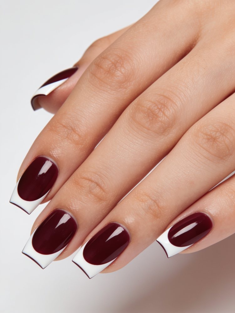 Long square acrylic nails with a crisp deep white French tip