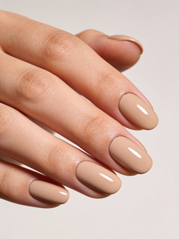 Medium almond gel nails in a skin matched nude
