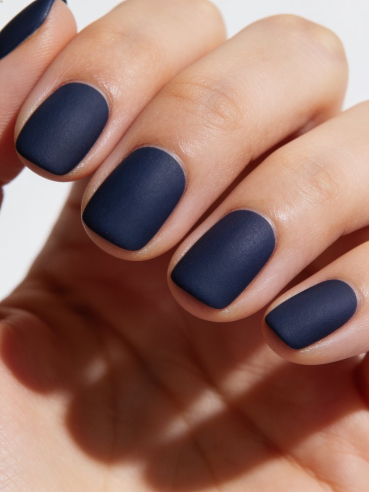 Short squoval nails in matte deep navy